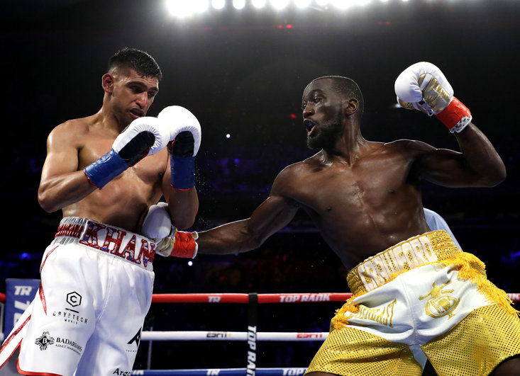 Crawford en route to a TKO win over Amir khan in 2019 (getty images)