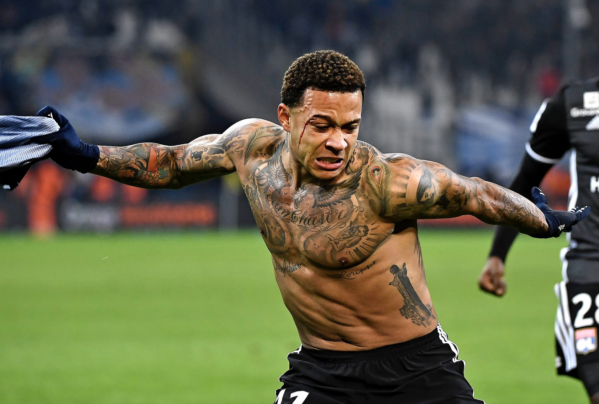 Soccrates Images - Memphis Depay of Holland Tattoo Lion